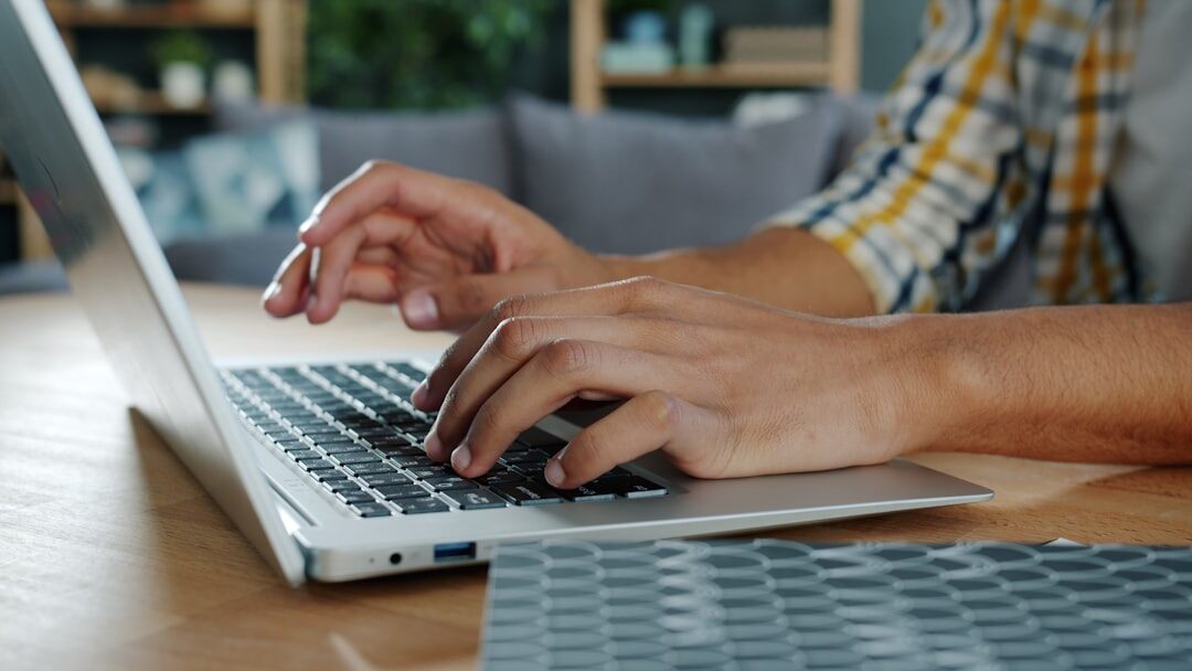 writer at desk typing
